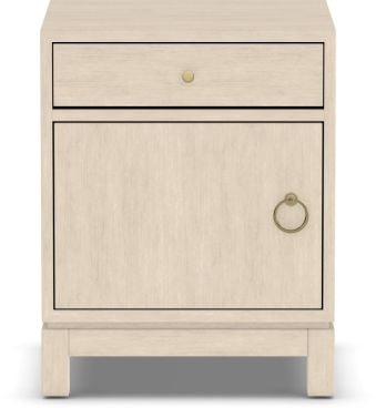 A sleek, handcrafted wooden nightstand with a light finish, featuring a single drawer and a cabinet with a brass ring handle for elegant bedroom storage.