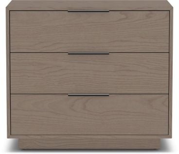 Modern three-drawer dresser in a neutral wood finish with sleek black metal handles, offering stylish and functional bedroom storage.