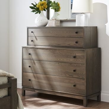 solid wood dresser with smaller upper drawers