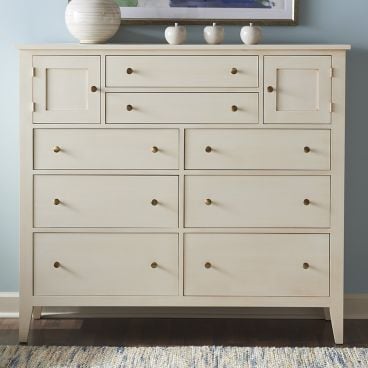 A real wood dresser made from sustainably sourced Appalachian hardwood, designed with spacious storage drawers and soft-close doors for refined organization.