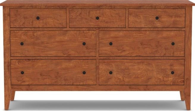 A handcrafted solid cherry wood dresser with seven dovetail-joined drawers, designed for durability and timeless elegance.