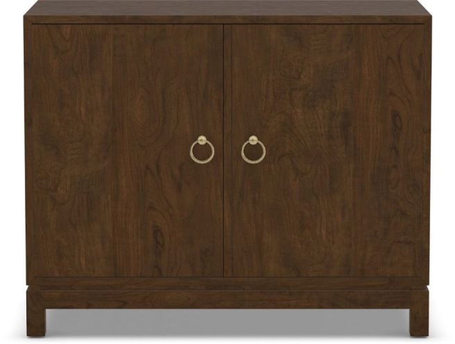 A sleek wooden storage cabinet with a minimalist design and two doors for concealed organization.