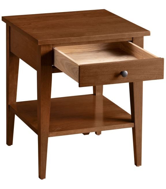 Wooden side table with an open drawer showing dovetail construction, showcasing craftsmanship.
