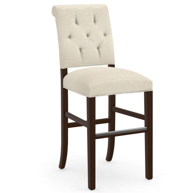 Chic upholstered chair with a classic tufted design and dark wood legs