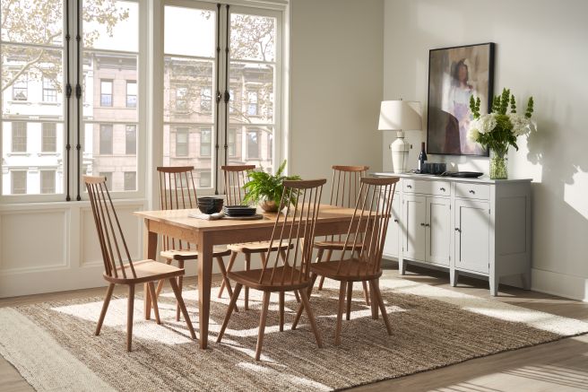 real wood chairs around a real wood dining table